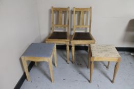A pair of pine leather seated dining chairs and two dressing stools