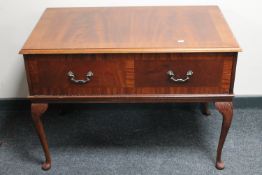 A mahogany stereogram cabinet on cabriole legs