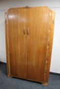 A 1930's oak double door wardrobe