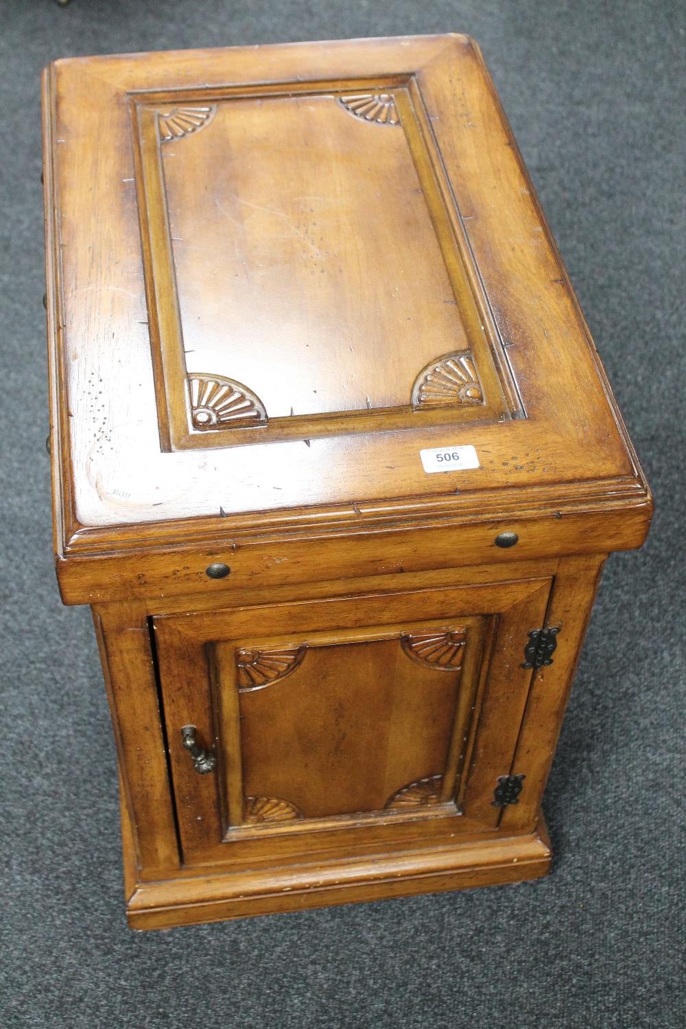 A colonial style single door cupboard