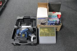 A cased Powercraft circular saw together with a Dremel multi tool and a further box containing