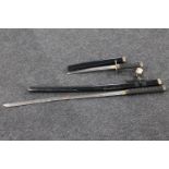 A Japanese samurai style sword and similar dagger