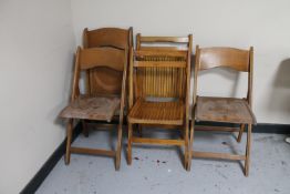 Five folding chairs