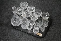 A tray of assorted glass ware - two decanters with stoppers, drinking glasses,