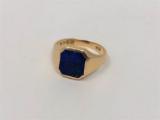 An 18ct gold lapis lazuli signet ring, size T1/2 CONDITION REPORT: 10.