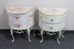 A pair of floral bedside stands