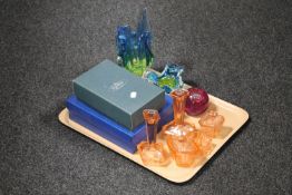 A tray containing a part Art Deco glass dressing table set, Caithness fireball paperweight,