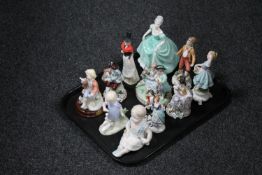 A tray of a collection of continental figurines, Coalport Ladies of Fashion figurine Henrietta,