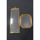 A decorative gilt framed mirror and an octagonal mirror