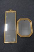 A decorative gilt framed mirror and an octagonal mirror