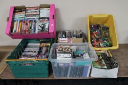 Seven boxes and crates containing assorted DVD's, CD's,