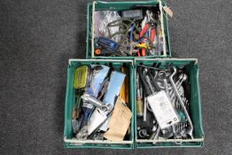 Three plastic crates containing assorted hand tools