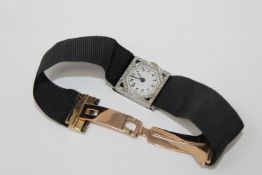 A superb quality 1920's platinum set diamond and sapphire Art Deco wristwatch on a large 18ct