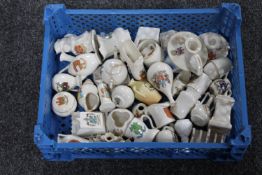 A basket of a quantity of antique tourist china