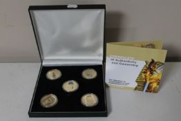 A set of five gold layered sterling silver The Treasures of Tutankhamun Golden Commemorative Gift
