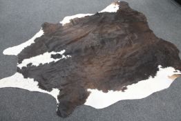 A cow hide rug