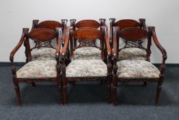 A set of six Victorian style armchairs upholstered in floral tapestry fabric