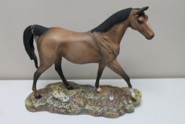 A Royal Doulton horse on plinth in brown matte finish CONDITION REPORT: Transparent