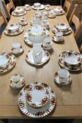 Approximately sixty-nine pieces of Royal Albert Old Country Roses tea and dinner china