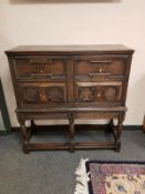 An early 18th century oak cabinet,