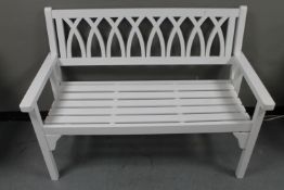 A folding wooden garden bench