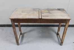 A mid 20th century double school desk