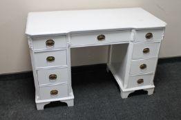 A painted Edwardian dressing table fitted nine drawers (no mirror)