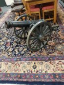 An ornamental cast iron cannon,