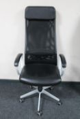 A black leather and mesh high backed swivel office armchair