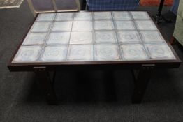 A 20th century stained pine framed tile topped coffee table