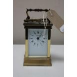 A French brass cased Angelus carriage clock with key