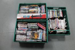 Three crates containing assorted DVD's