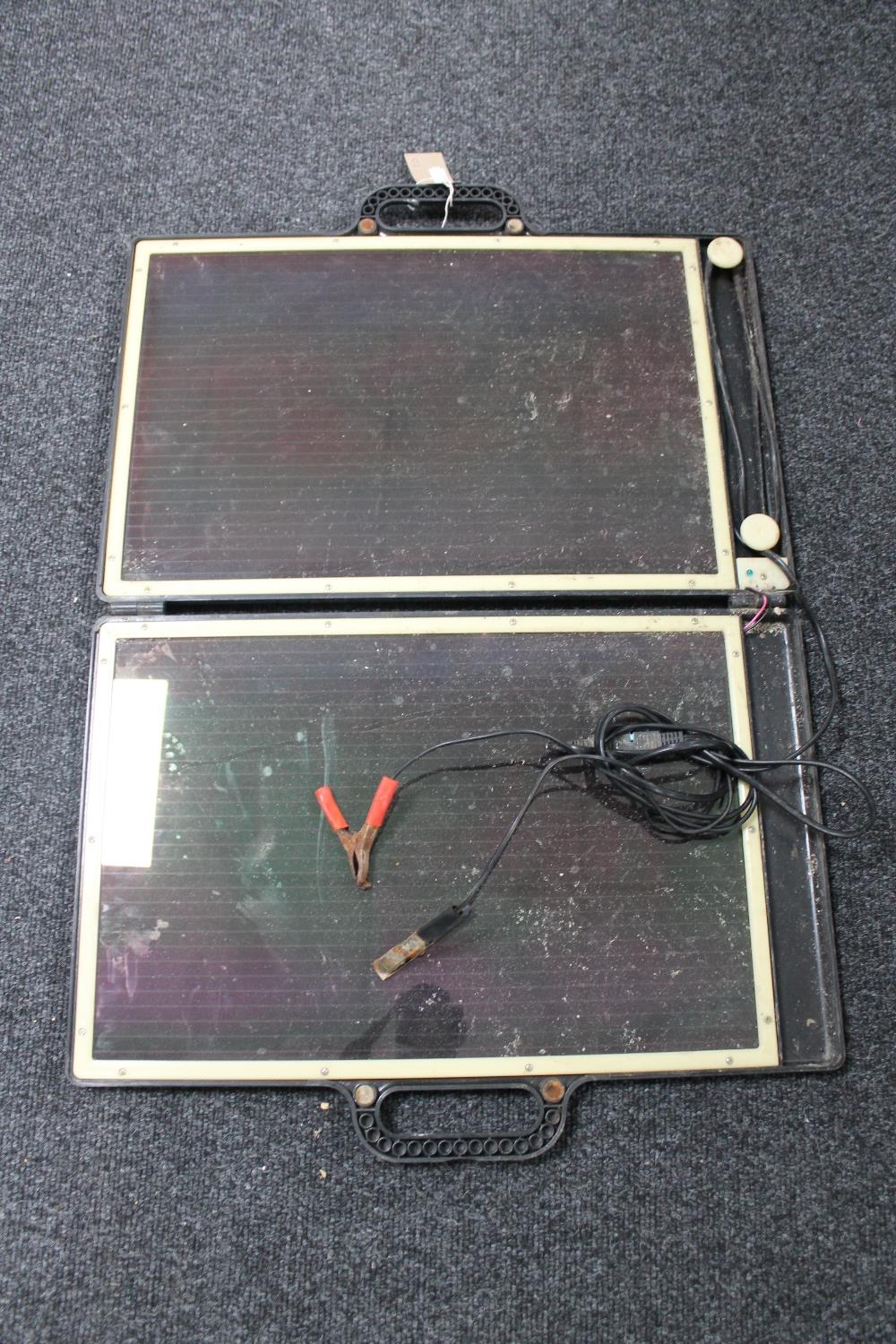 A portable cased solar panel kit