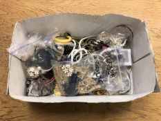 A box of assorted costume jewellery and silver items