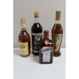 Four bottles of alcohol - 70cl Cointreau, 70cl Metaxa,