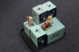 A tray containing seven boxed Pendelfin rabbit figures