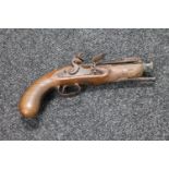 A fantasy flintlock pistol with spring loaded bayonet and ramrod, length 29 cm.