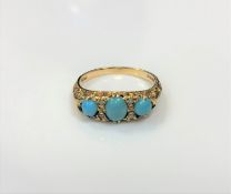 An 18ct gold diamond and turquoise ring, size N CONDITION REPORT: 4.