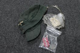 A German Third Reich M43 cap together with Russian front medal, two Luftwaffe eagles,