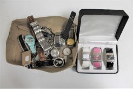 A box of a collection of lady's and gent's wristwatches