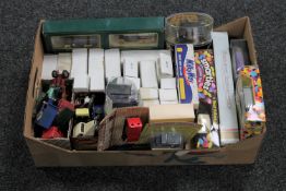 A box containing assorted boxed and unboxed die cast vehicles including Ringtons Transport,