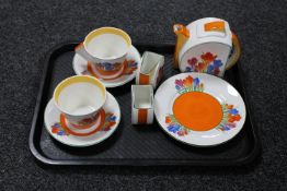 A eight piece Clarice Cliff inspired tea for two