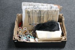 A box of large quantity of costume jewellery, jewellery stands, purses,