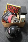A box of motor cycle helmet, vintage camera and accessories,