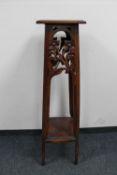 A Victorian style mahogany plant stand