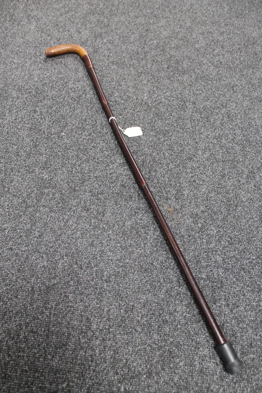 An antique cane 'Sunday' stick with briar head, length 93 cm.