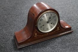 An early 20th century inlaid mahogany mantel clock with silvered dial