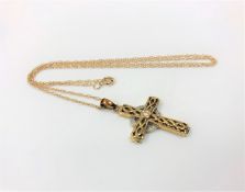 A 9ct gold diamond set Celtic cross pendant on chain