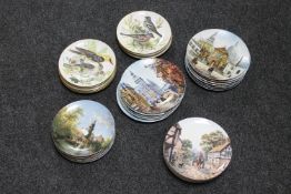 A set of twelve Limoges collector's plates depicting scenes of France together with six BradEx