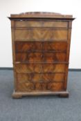 A 19th century continental mahogany secretaire chest